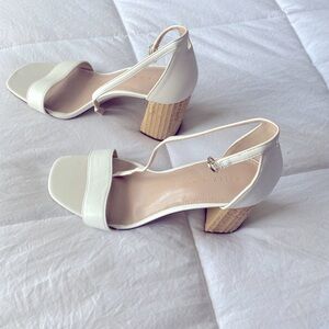 White heals with wicker heel.